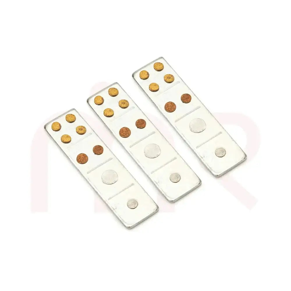 Three silver metal strips with copper and brass studs for Vastu Shastra remedies.