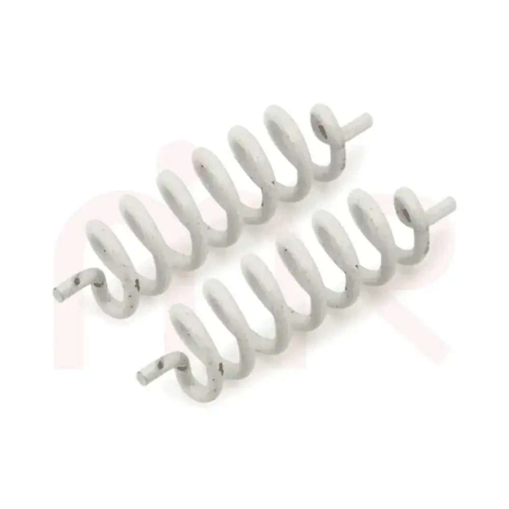 Two white spiral metal strips for Vastu remedy and space balancing.