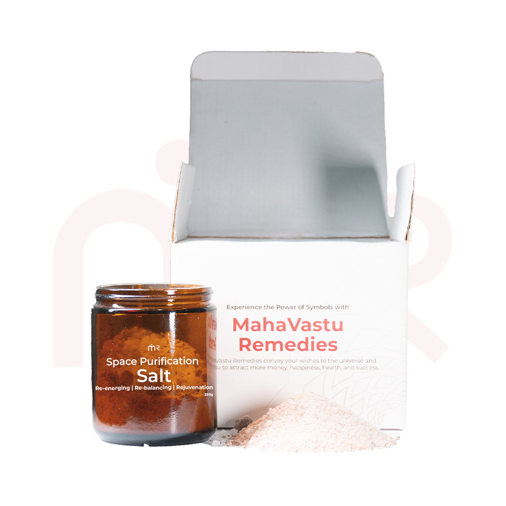 MahaVastu Remedies Space Purification Salt jar and loose salt next to a white shipping box.