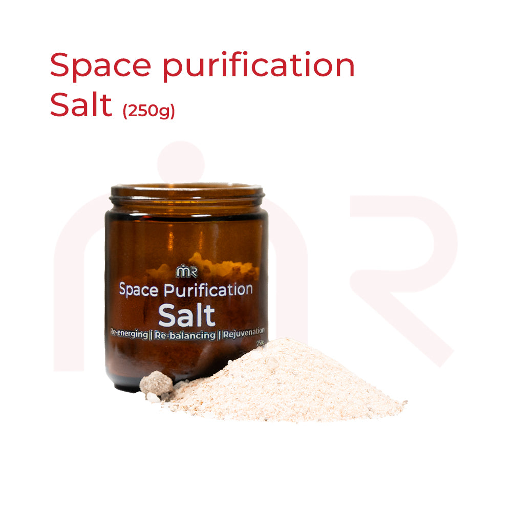 MahaVastu Remedies Space Purification Salt in a brown glass jar with a pile of salt.