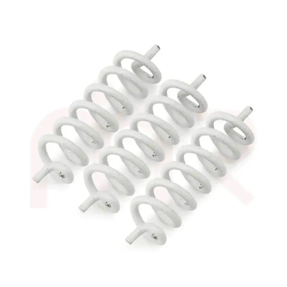 Set of white metal strips for Vastu remedies and space balancing.