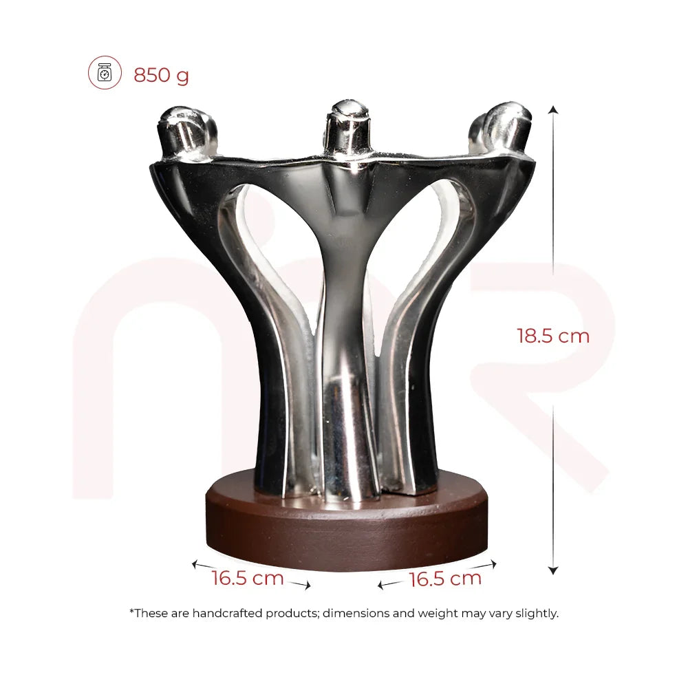 Handcrafted metal teamwork statue for Vastu remedy, 18.5 cm tall, 850 g, on wooden base
