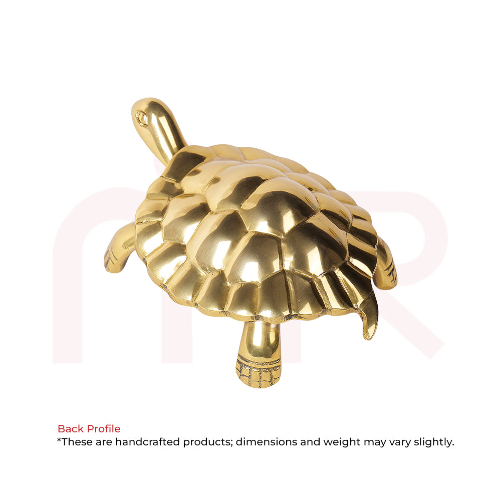 Handcrafted brass tortoise figurine for Vastu remedies, shown on a white background