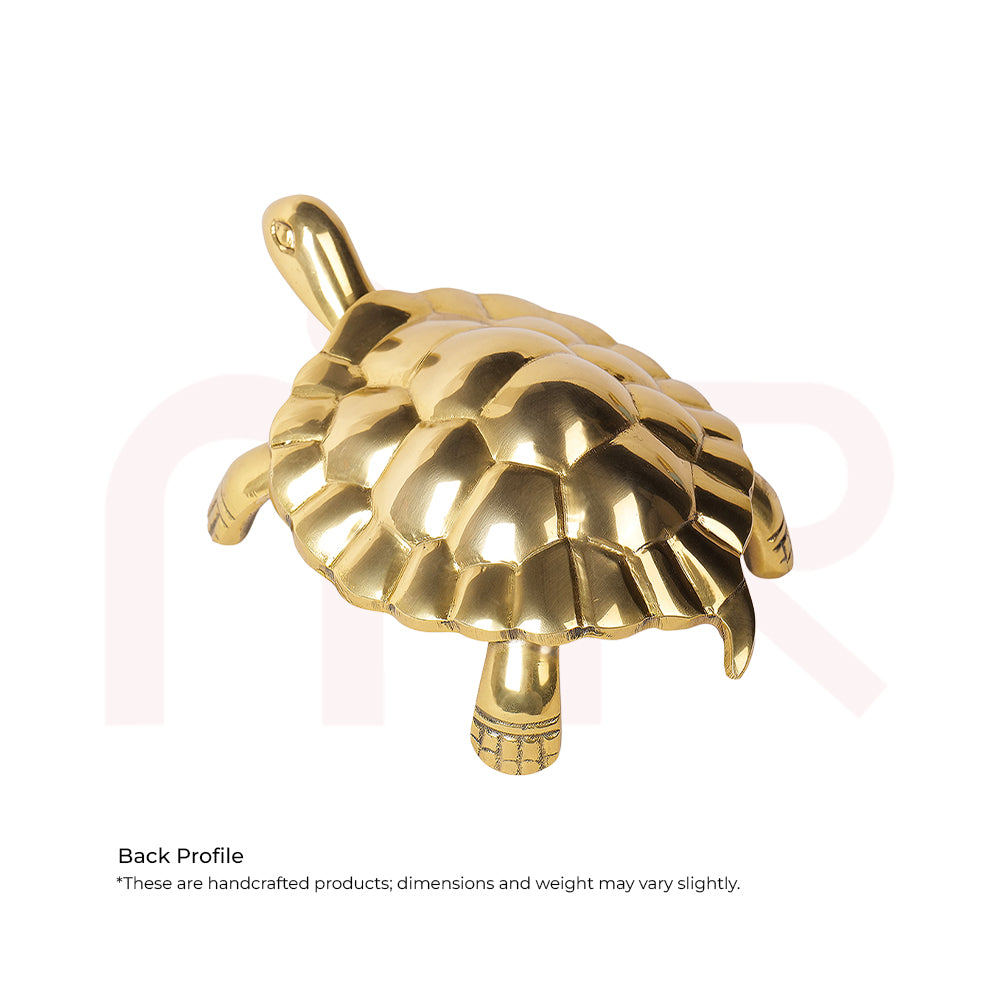 Handcrafted brass tortoise figurine for Vastu remedies, shown on a white background