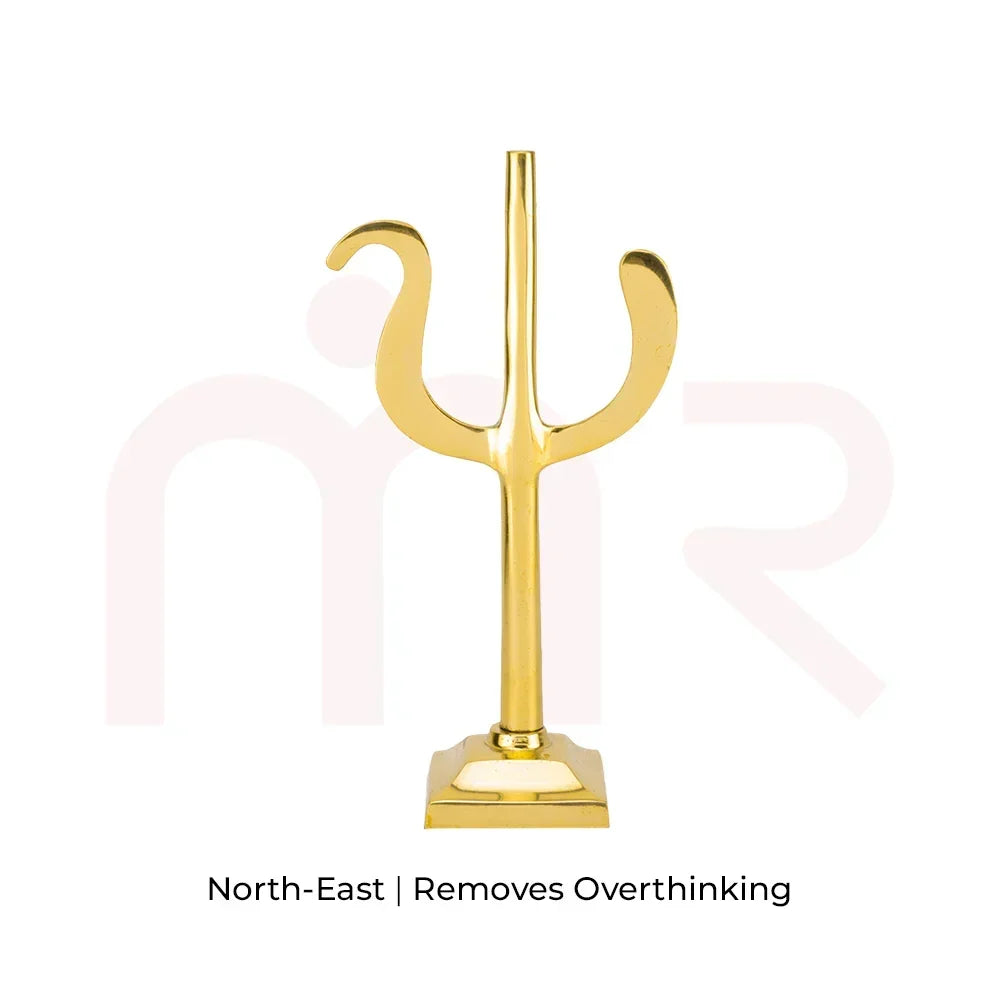 Golden Trishul vastu remedy statue for north-east direction, promotes clarity and positivity