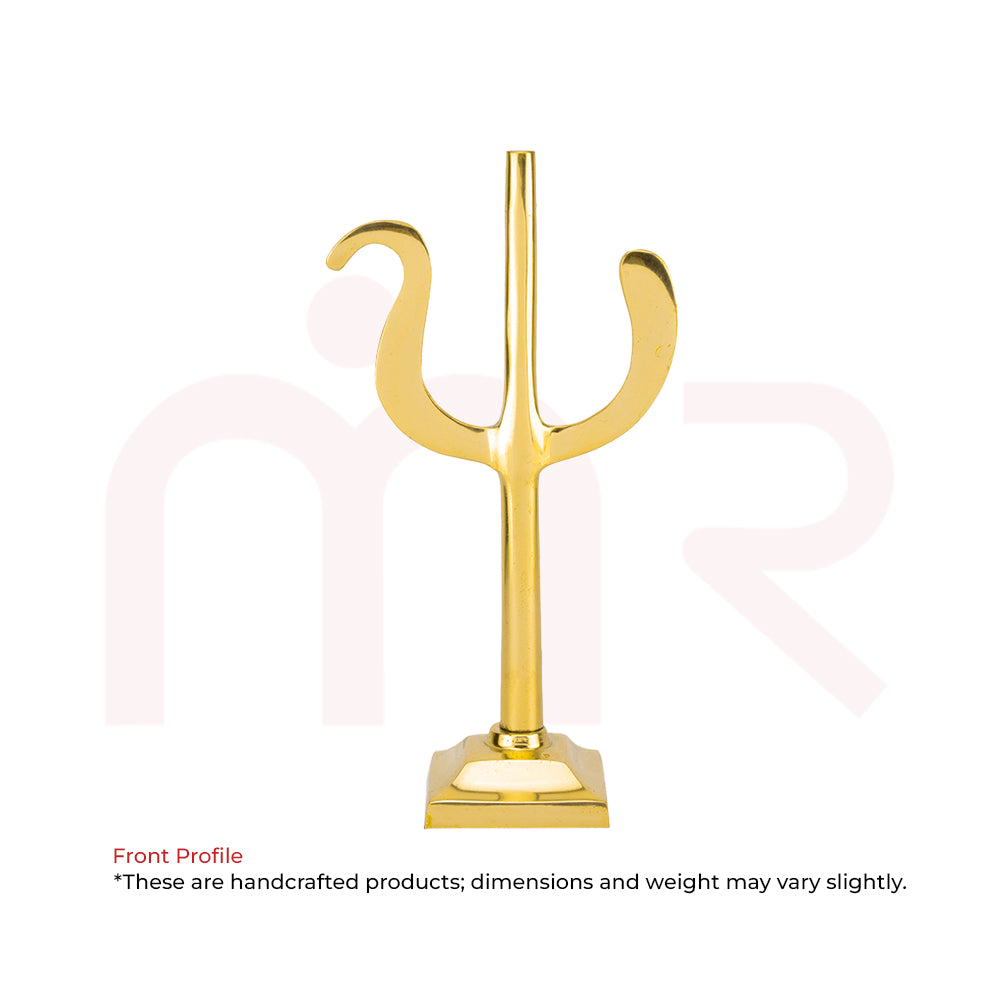 Handcrafted golden brass trishul for Vastu remedies on white background