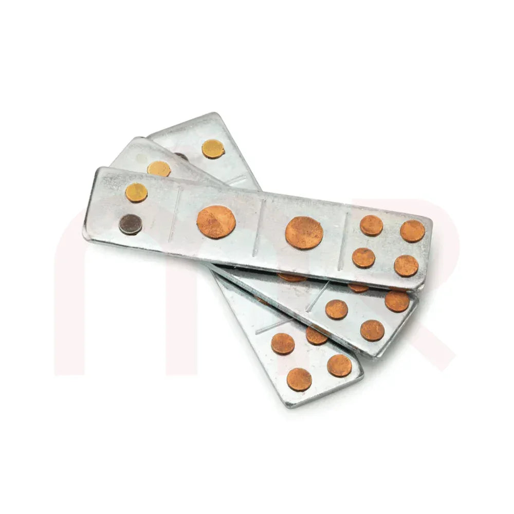 Three Vastu remedy metal strips with copper dots for energy balancing on white background