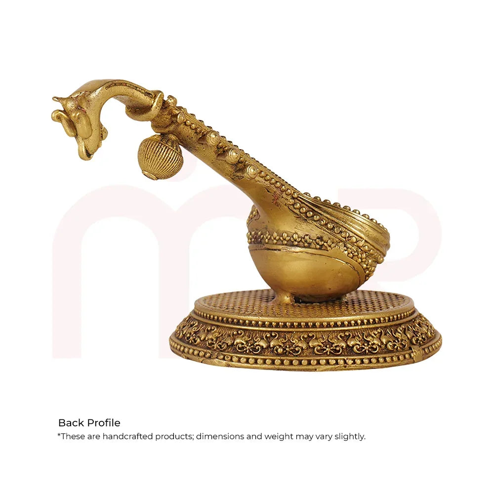 Handcrafted brass Veena idol on ornate round base, ideal for Vastu remedies and home decor.