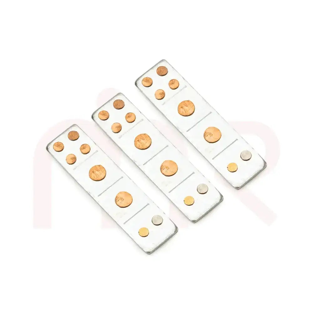 Set of three silver Vastu metal strips with copper studs for space balancing remedies.