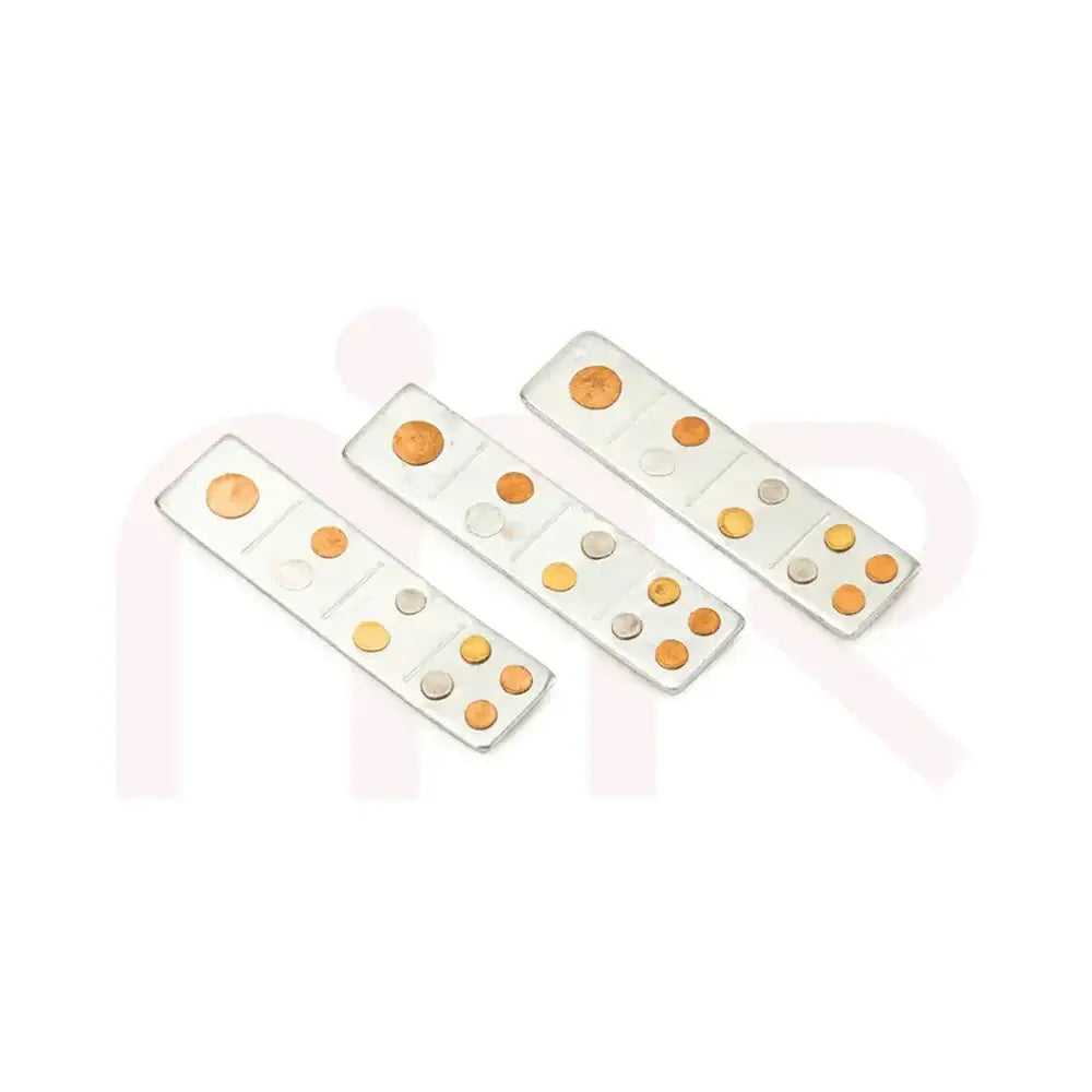 Set of three silver metal strips with copper and brass inlay for Vastu remedies.