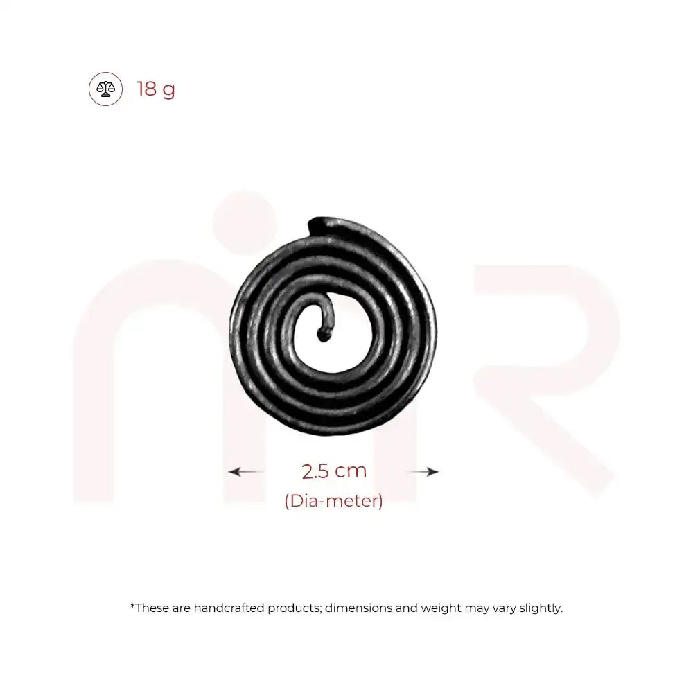 Small black metal strip coil, 2.5 cm diameter, for Vastu remedies.