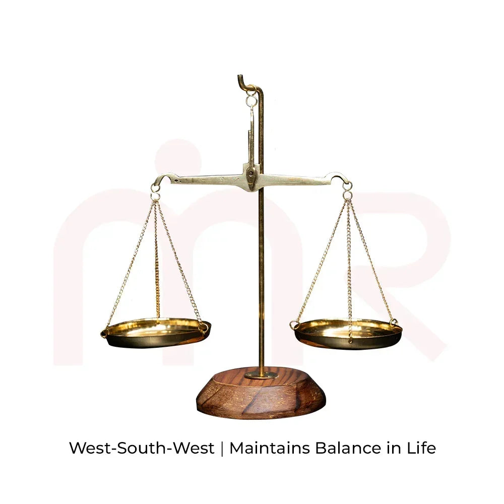 Brass weighing scale on wooden base, Vastu remedy for balance and positivity in life.