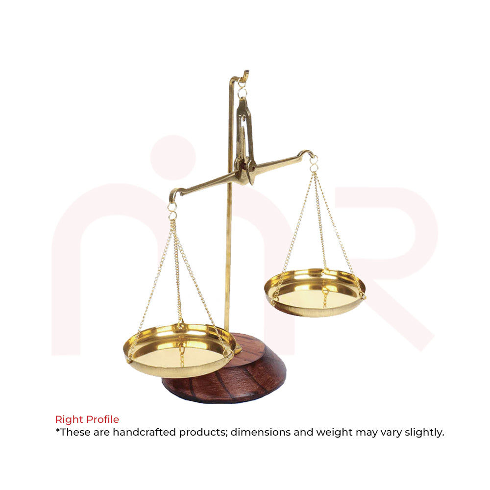 Handcrafted brass weighing scale with wooden base, used for Vastu remedies and decor