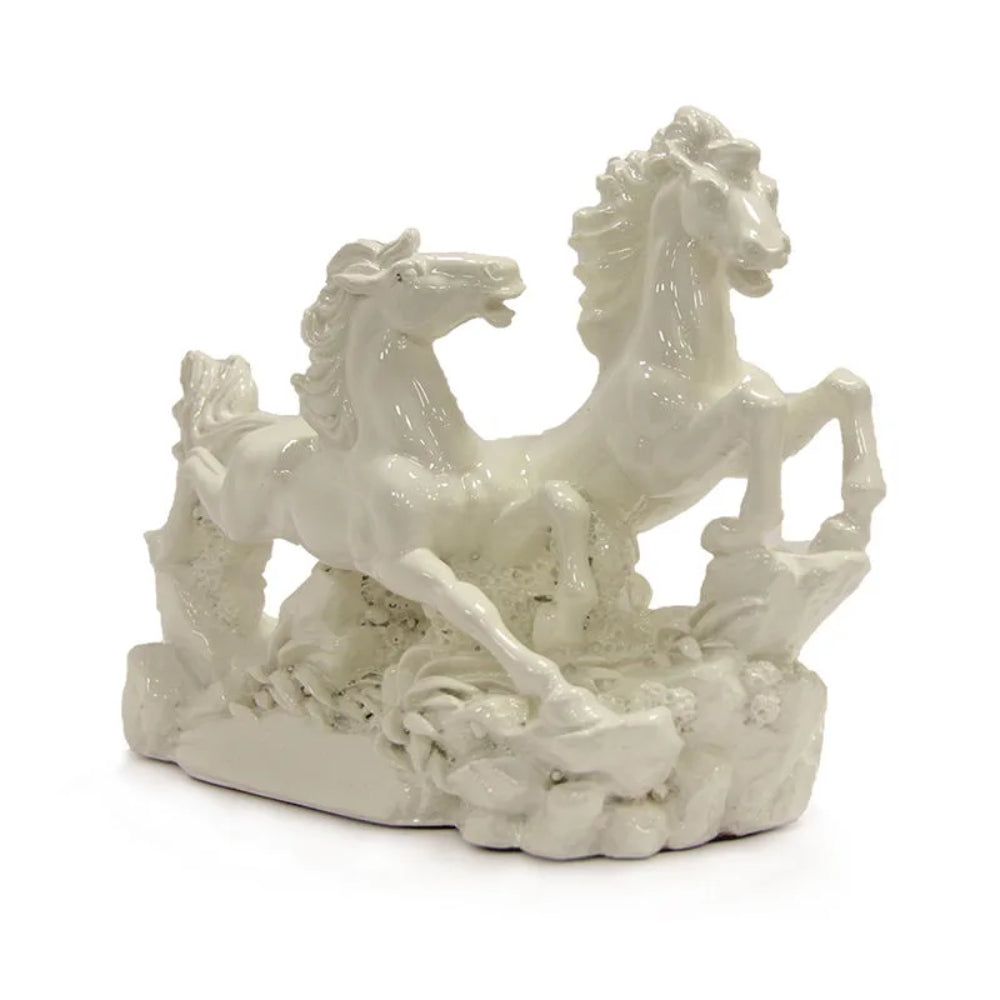 Maha vastu Porcelain figurine of two white horses in mid-gallop, showcasing dynamic movement and detailed musculature, set on a decorative base, to balance vastu for house facing south