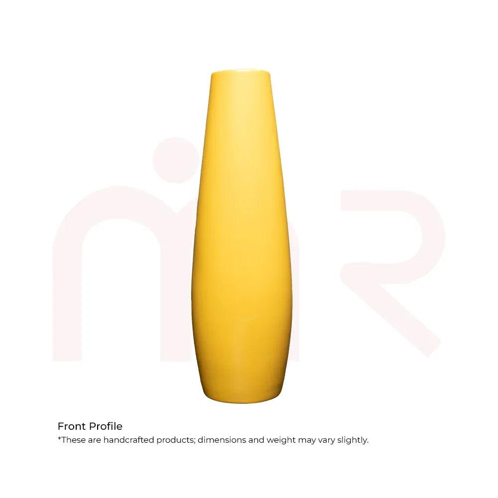 Tall yellow ceramic vase with smooth finish, ideal for Maha Vastu remedies and home decor.