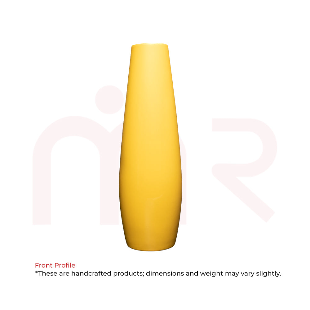 Tall yellow ceramic vase with smooth finish, ideal for Maha Vastu remedies and home decor.