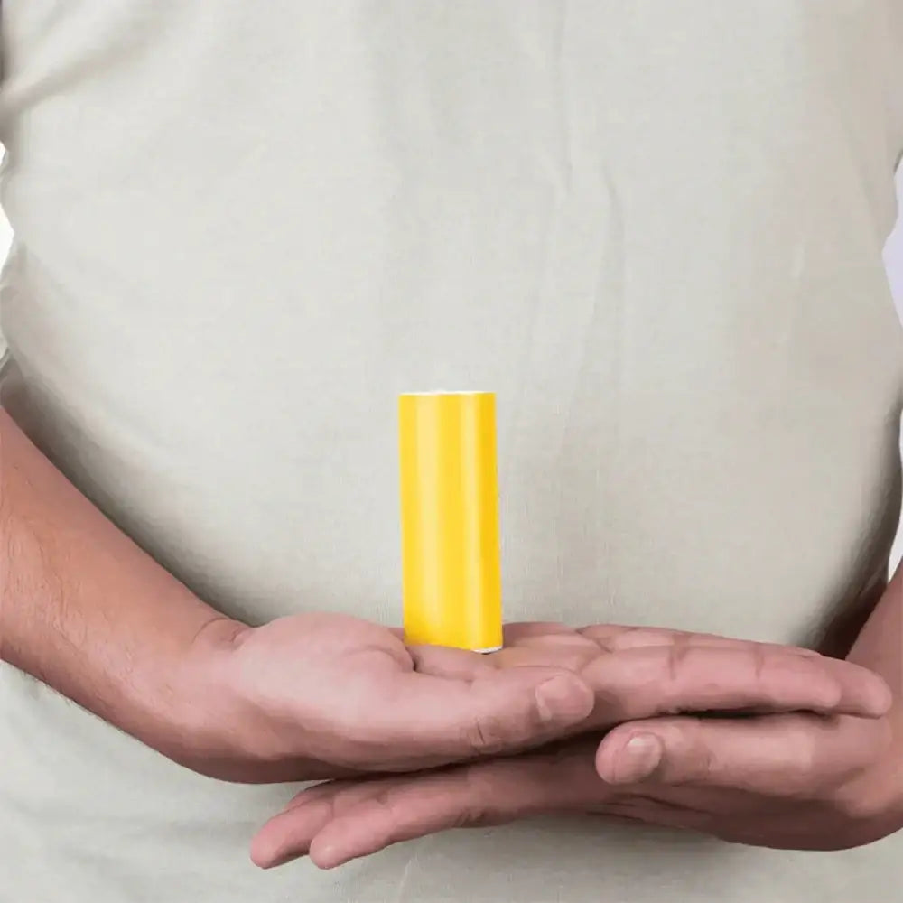 Yellow Vastu color tape held in hands for home energy balance and positivity