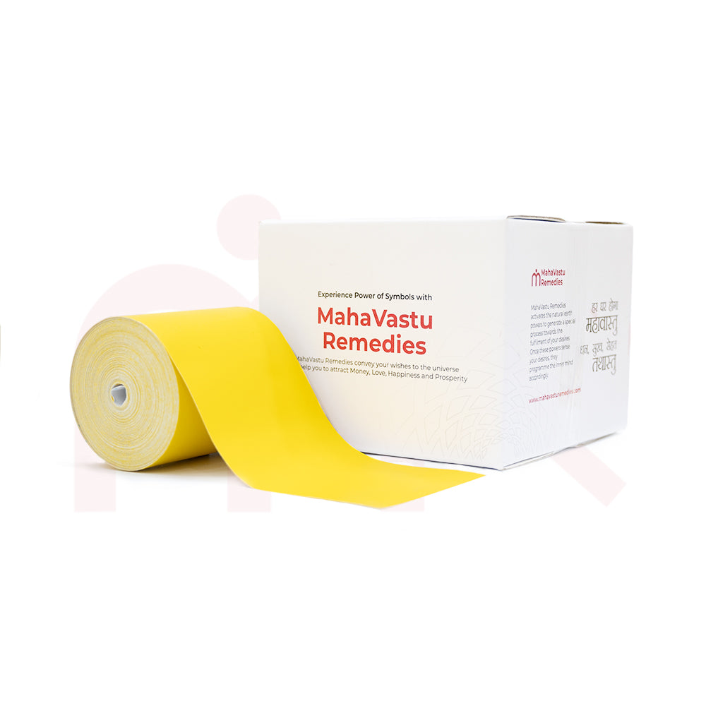 Yellow MahaVastu color tape roll beside branded MahaVastu Remedies box for Vastu Shastra