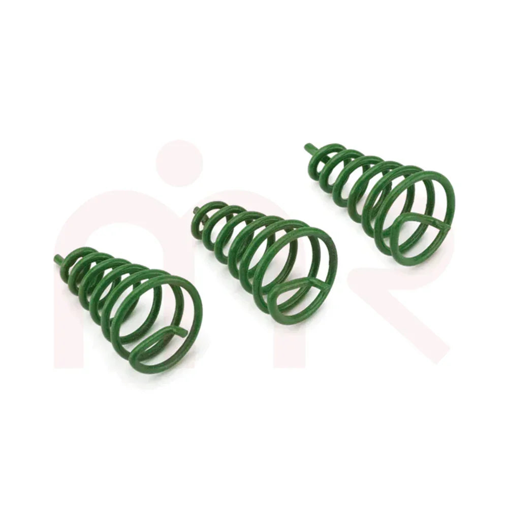 Green MahaVastu air spiral remedies set of three on white background for Vastu balance