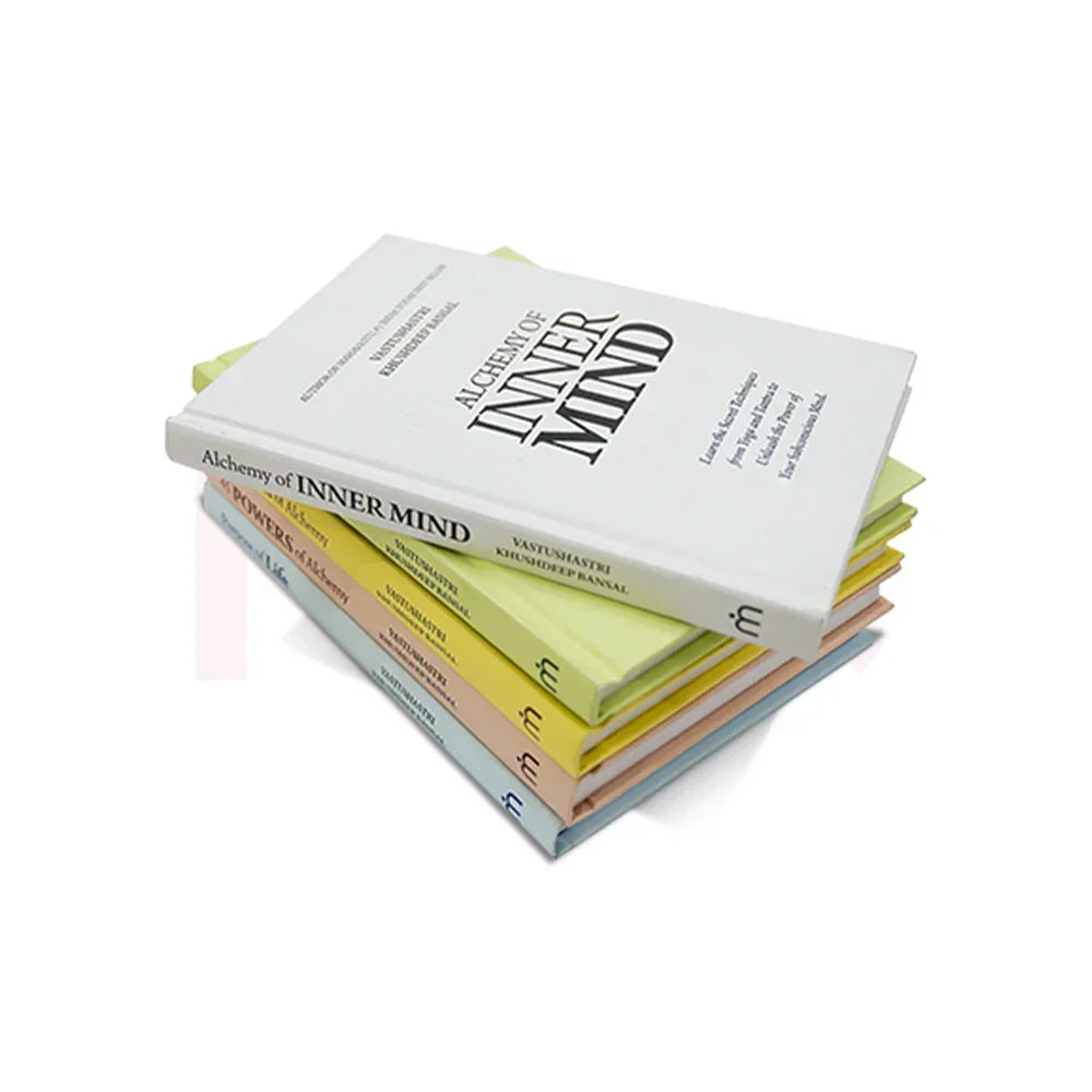 Stack of Vastu books including Alchemy of Inner Mind with colorful covers on white background