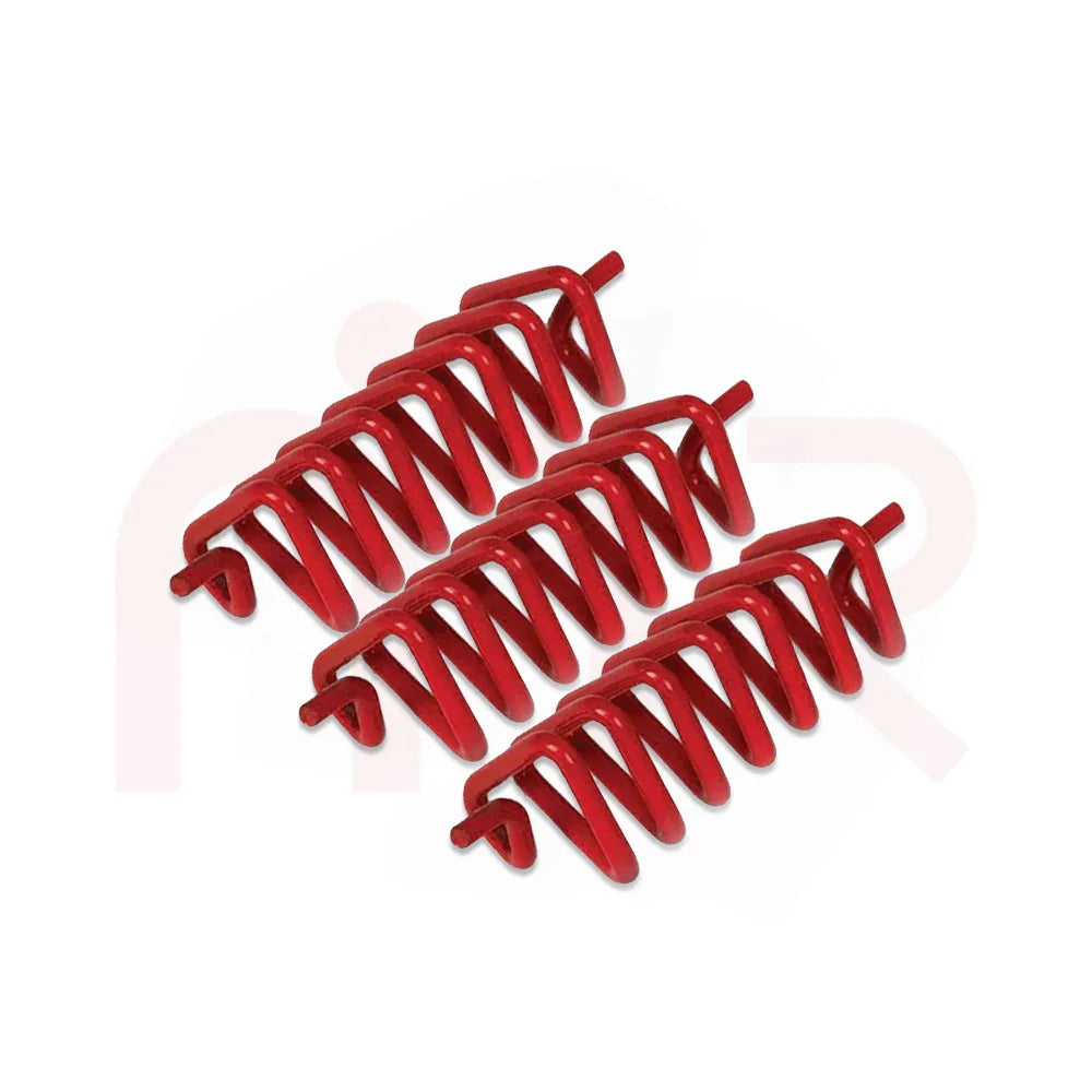 Red MahaVastu fire element remedy springs arranged in a triangle for Vastu correction