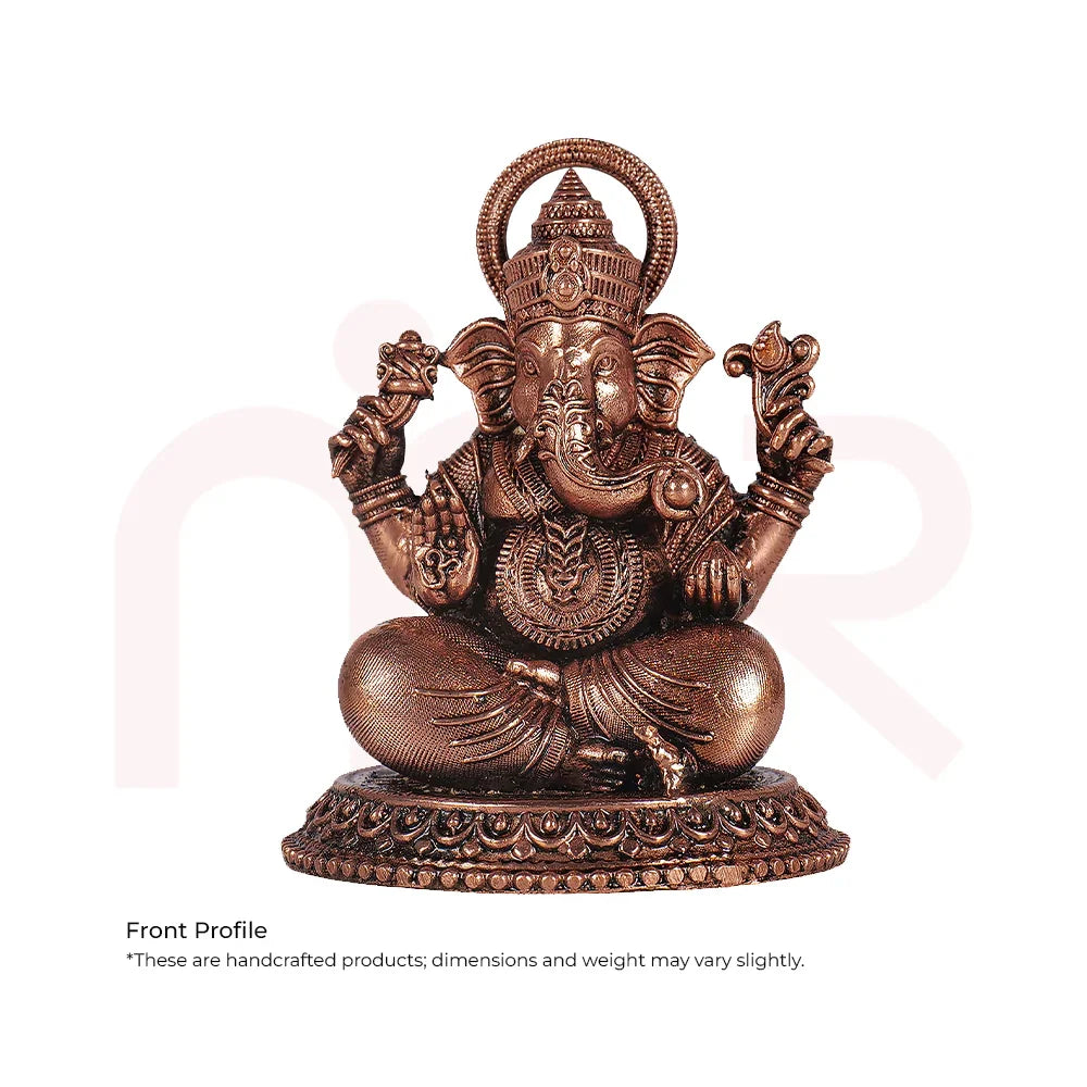 Handcrafted brass Ganesh idol for Vastu, detailed seated deity sculpture, home decor remedy