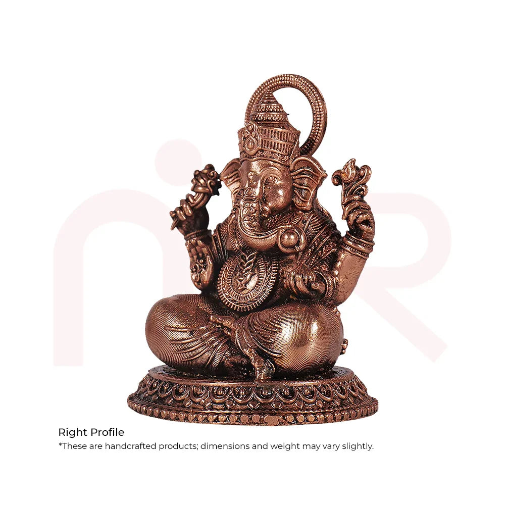 Handcrafted bronze Ganesh idol for Maha Vastu remedies, detailed Hindu god statue on white background