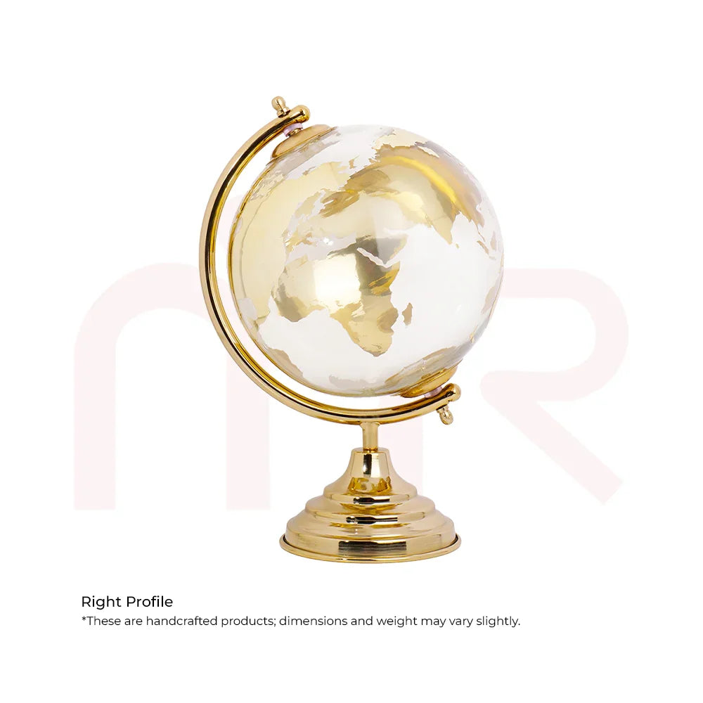 Handcrafted golden and white Vastu globe on metallic stand, ideal for home positivity