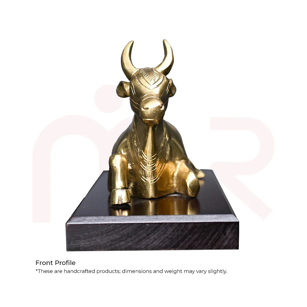 Handcrafted brass Nandi idol on a wooden base, MahaVastu Vastu Shastra remedy decor.