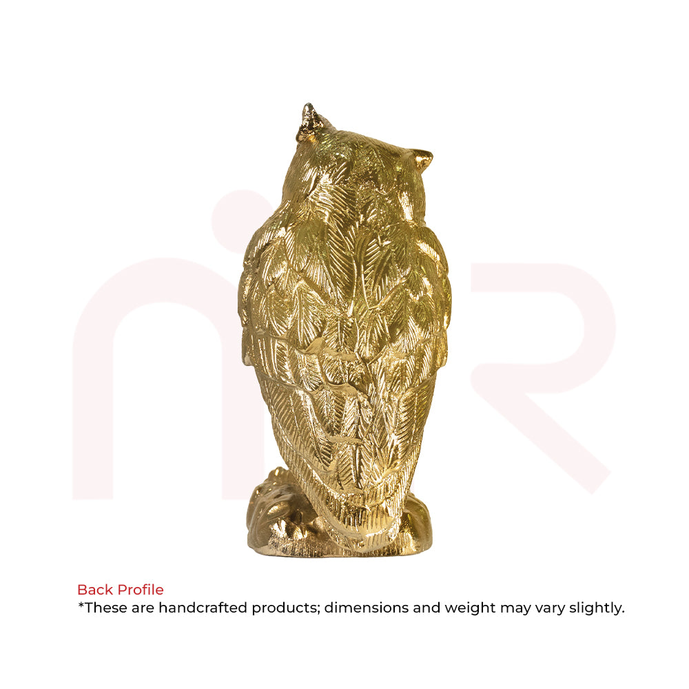 Back profile of a golden owl figurine by MahaVastu Remedies for smart money decisions.