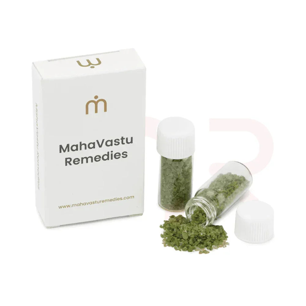 MahaVastu Remedies box with two vials of green vastu remedy crystals on a white background