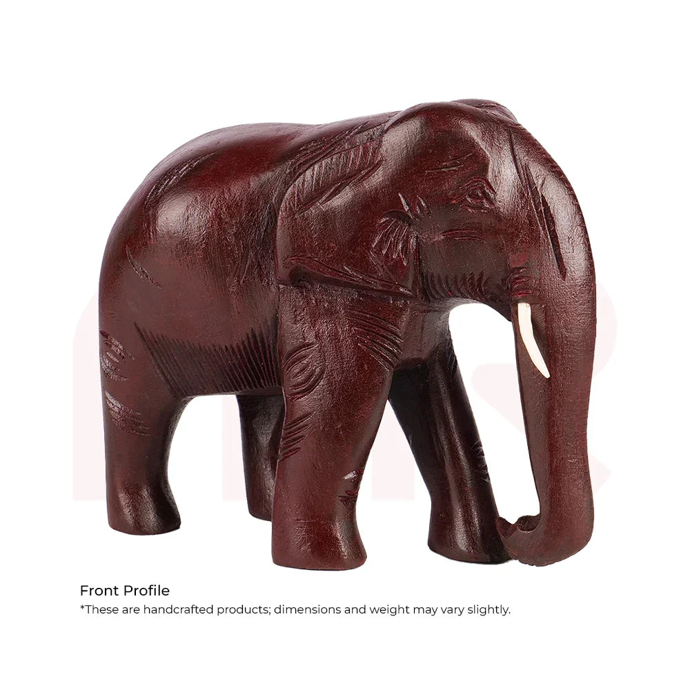 Handcrafted red elephant figurine for Vastu, wood texture, symbol of prosperity decor