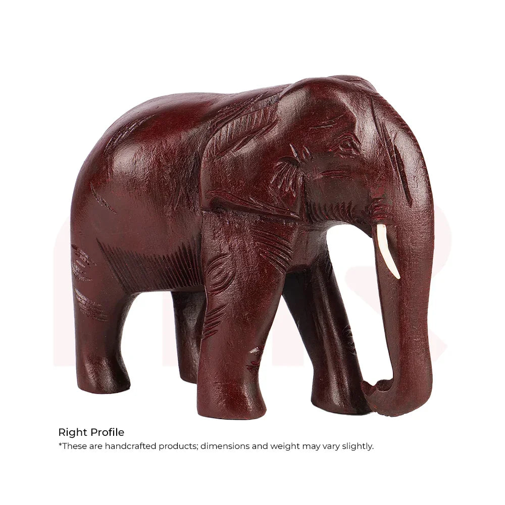 Handcrafted red wooden elephant statue with carved details for Vastu decor