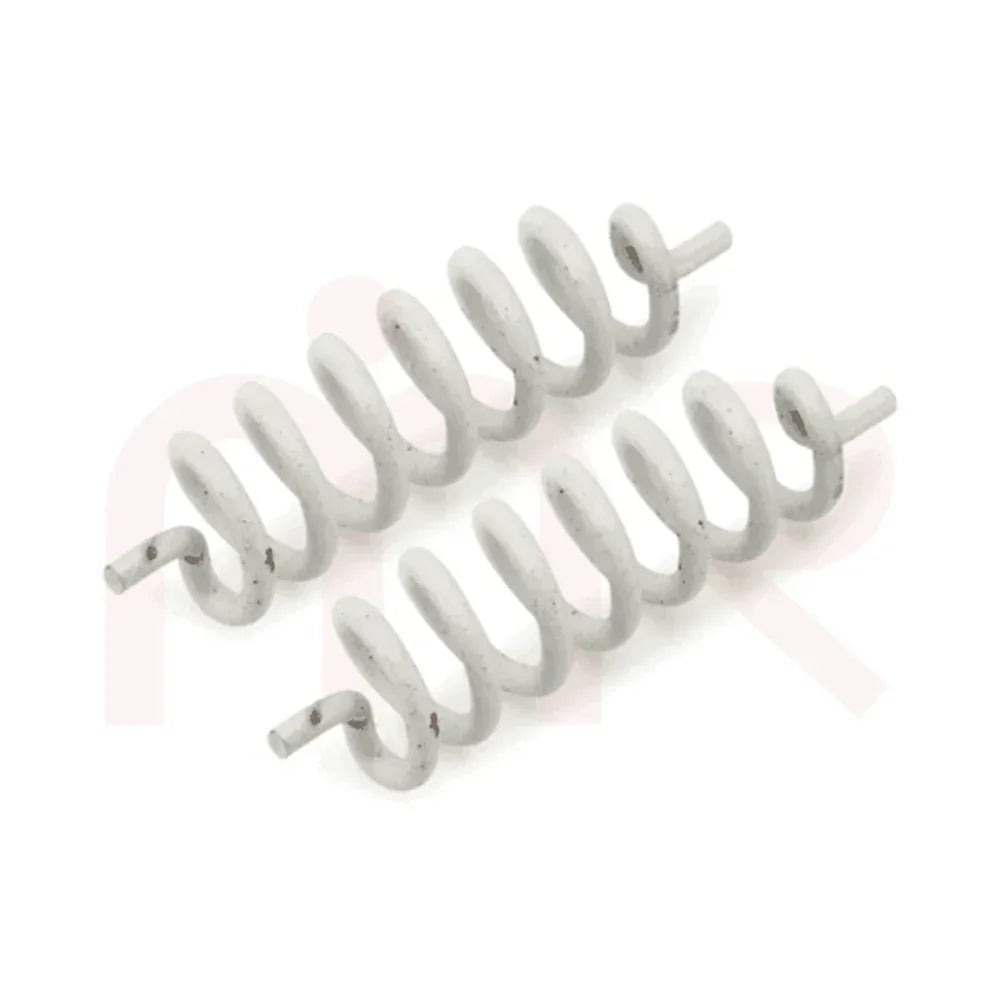 Pair of white metal vastu coils for MahaVastu remedies on white background
