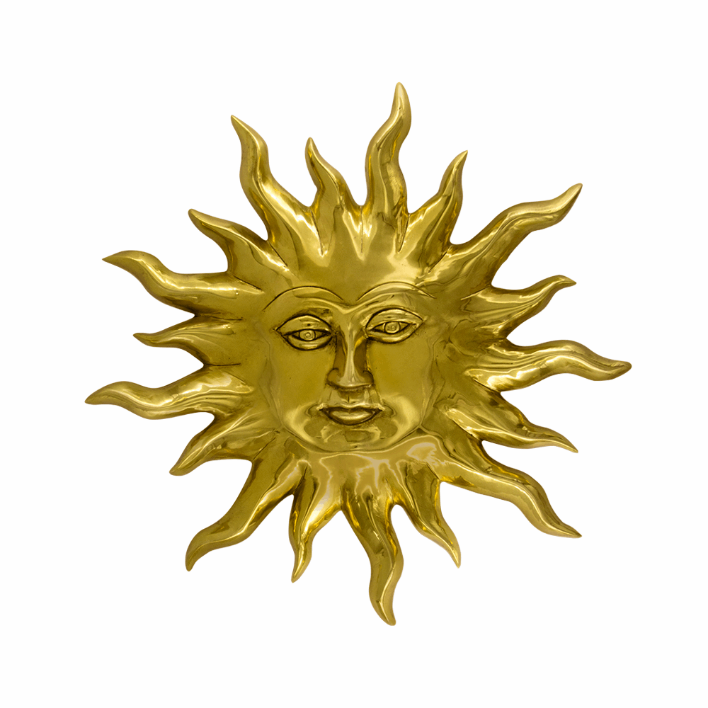 Wall hanging decorative and vastu remedy of a golden color Sun with radiant beams. Depiction of smiling face of Surya Dev, a hindu god, made in brass.