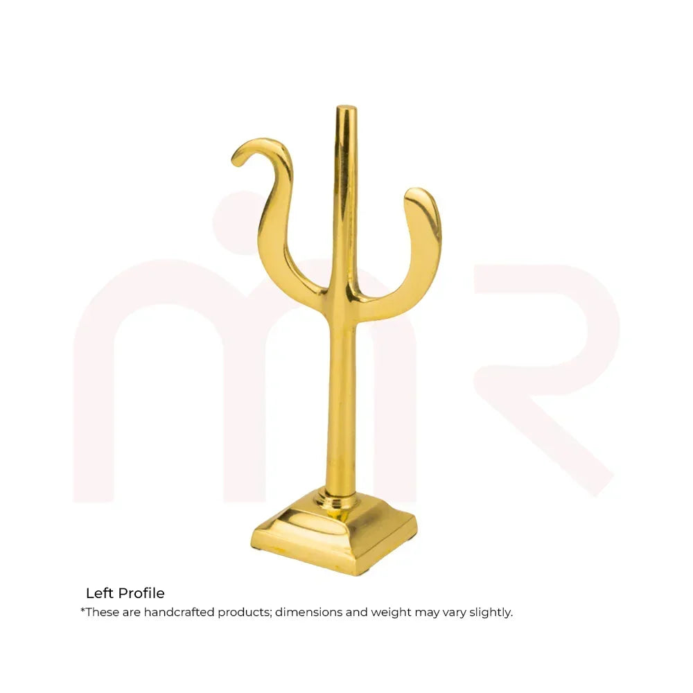 Handcrafted brass trishul for vastu remedy, gold finish, placed on white background