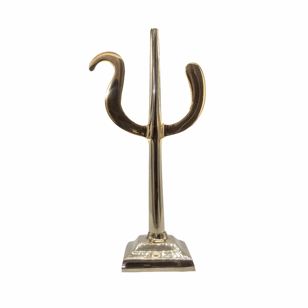 Brass statue of a Trishul, polished to a shine, with three prongs that have a central straight prong and two outer prongs curving outward, featuring square-shaped base with visible engravings.
