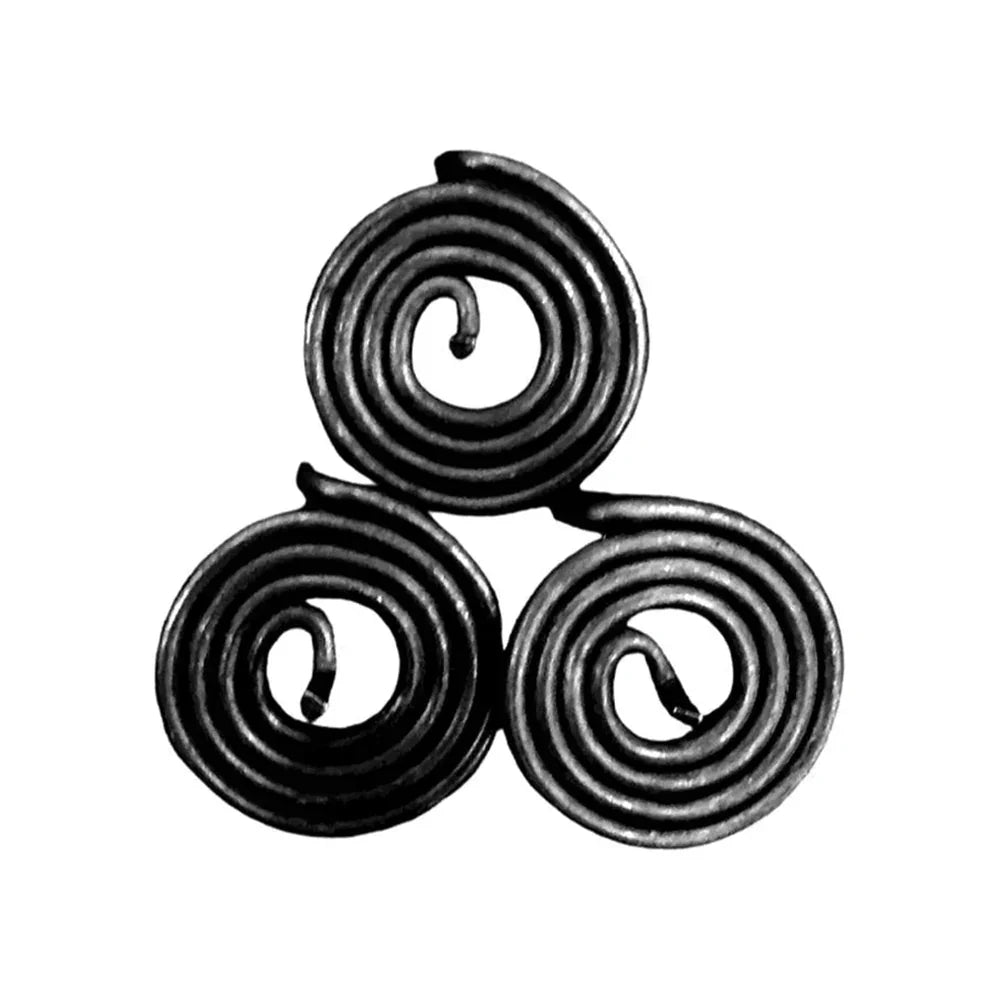 Black metal spiral MahaVastu water remedy coil, used in Vastu Shastra for balance and positivity
