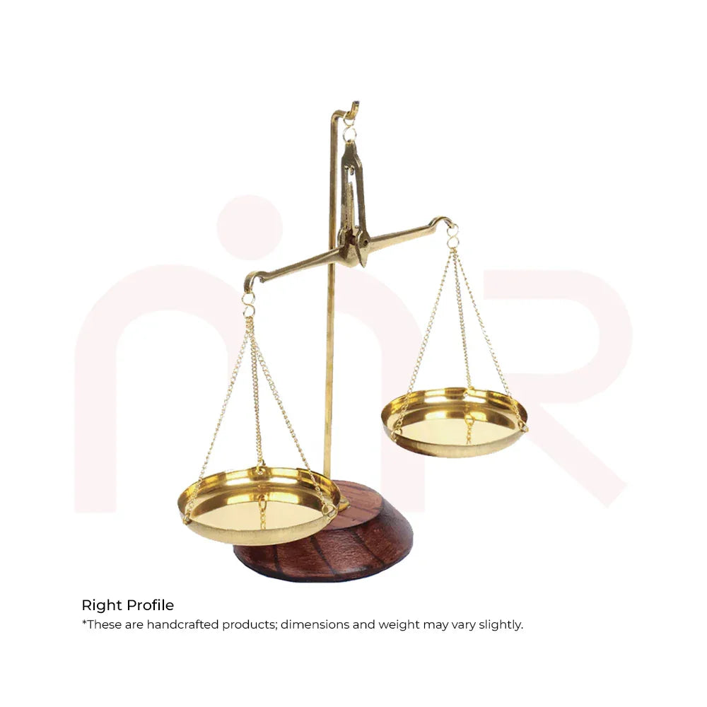 Handcrafted brass weighing scale with wooden base, used for Vastu remedies and decor